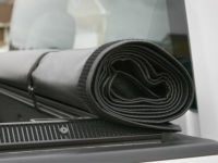 GM 22894983 Short Box Soft Roll-Up Tonneau Cover in Black with Bowtie Logo